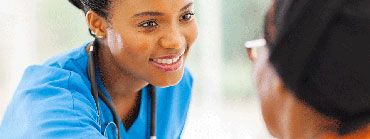 nurse helps patient