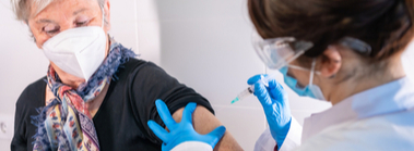 woman getting a covid vaccine shot