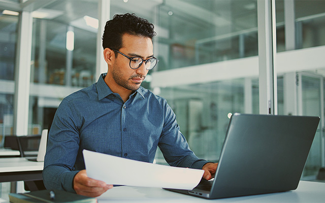 Man sitting at computer in an office