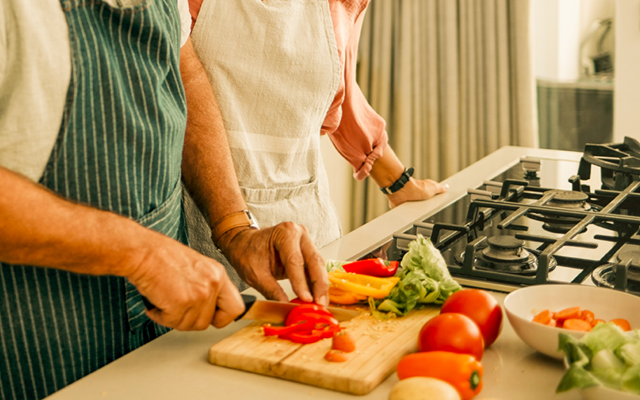 Two people cooking